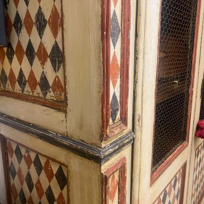 Florentine hand painted harlequin Cupboard late 19th century