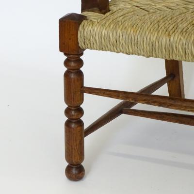 Folk Art Sculpted Wood and Straw Armchair