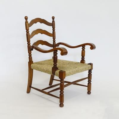Folk Art Sculpted Wood and Straw Armchair