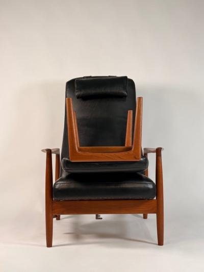 Folke Ohlsson Folke Ohlsson Recliner and ottoman for Dux in Black Leather