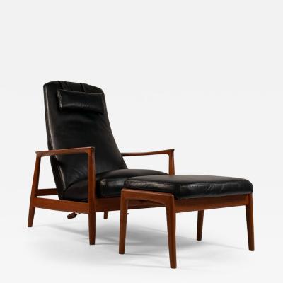 Folke Ohlsson Folke Ohlsson Recliner and ottoman for Dux in Black Leather