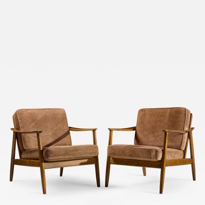 Folke Ohlsson Folke Ohlsson for Dux Model 247 Mid Century Walnut and Cane Lounge Chairs Pair