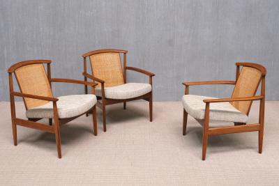 Folke Ohlsson Three Folke Ohlsson Dallas Armchairs in Teak and Cane DUX Sweden 1960s
