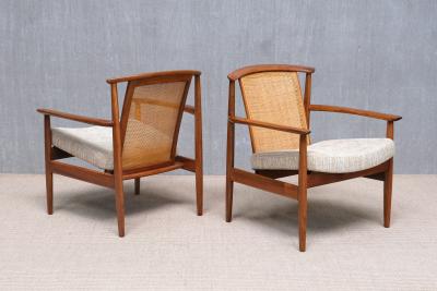 Folke Ohlsson Three Folke Ohlsson Dallas Armchairs in Teak and Cane DUX Sweden 1960s