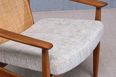Folke Ohlsson Three Folke Ohlsson Dallas Armchairs in Teak and Cane DUX Sweden 1960s