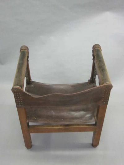 Four Franco Islamic Carved Wood and Leather Lounge Chairs