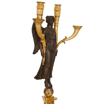 Four French Empire period bronze candelabra