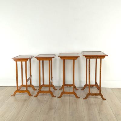 Four Satinwood Fancy Painted Nesting Tables England 19th century