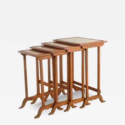 Four Satinwood Fancy Painted Nesting Tables England 19th century