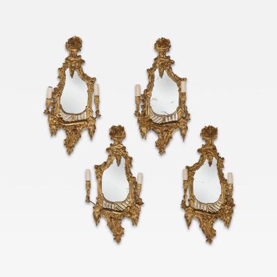 Four antique French girandoles in the Rococo style