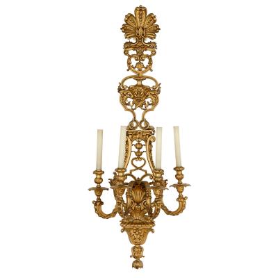 Four large Louis XV style gilt bronze sconces