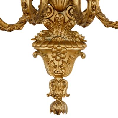 Four large Louis XV style gilt bronze sconces