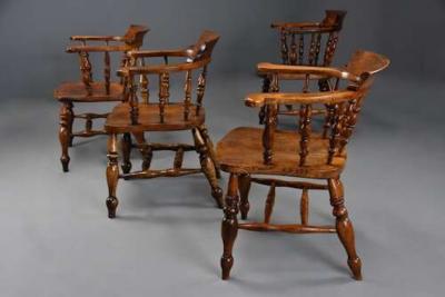 Four mid 19th century smokers bow Windsor or Captain s chairs