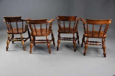 Four mid 19th century smokers bow Windsor or Captain s chairs