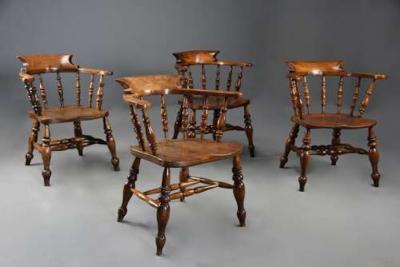 Four mid 19th century smokers bow Windsor or Captain s chairs
