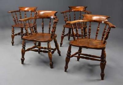 Four mid 19th century smokers bow Windsor or Captain s chairs