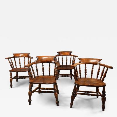 Four mid 19th century smokers bow Windsor or Captain s chairs