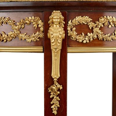 Fran ois Linke A gilt bronze and mahogany bois satine vitrine table by Francois Linke