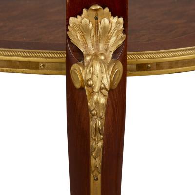 Fran ois Linke A gilt bronze and mahogany bois satine vitrine table by Francois Linke