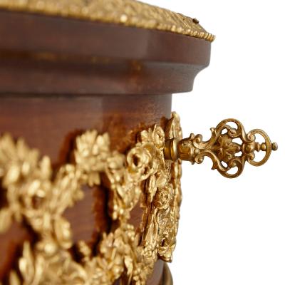 Fran ois Linke A gilt bronze and mahogany bois satine vitrine table by Francois Linke