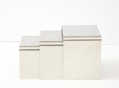 Fran ois Monnet Rare set of three nesting tables rendered in bent brushed stainless steel 