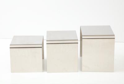 Fran ois Monnet Rare set of three nesting tables rendered in bent brushed stainless steel 