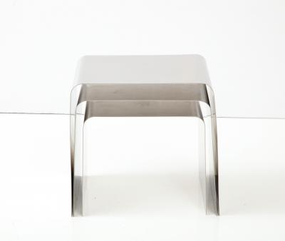 Fran ois Monnet Rare set of three nesting tables rendered in bent brushed stainless steel 