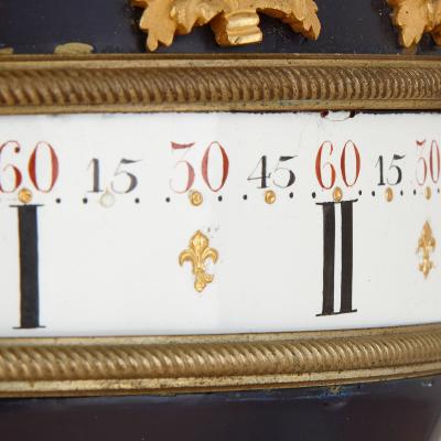 Fran ois Vion Antique French gilt bronze marble and tole revolving dial clock