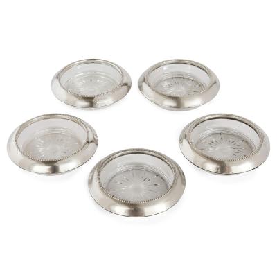 Frank Whiting Collection of five American silver and glass coasters by Frank M Whiting Co 