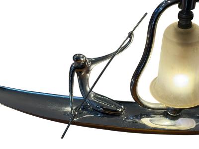 Franz Hagenauer ART DECO STYLIZED NUDE WITH PADDLE ON CANOE LAMP IN THE MANNER OF HAGENAUER
