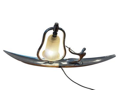 Franz Hagenauer ART DECO STYLIZED NUDE WITH PADDLE ON CANOE LAMP IN THE MANNER OF HAGENAUER