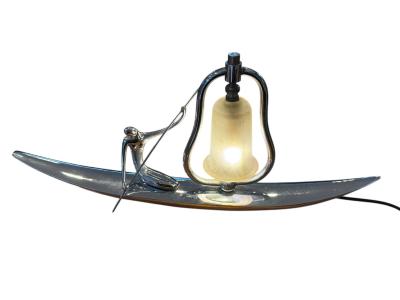 Franz Hagenauer ART DECO STYLIZED NUDE WITH PADDLE ON CANOE LAMP IN THE MANNER OF HAGENAUER