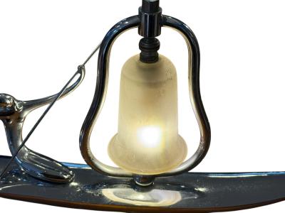 Franz Hagenauer ART DECO STYLIZED NUDE WITH PADDLE ON CANOE LAMP IN THE MANNER OF HAGENAUER