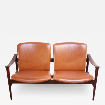 Fredrik Kayser Vintage Norwegian Modern Loveseat in Leather and Teak by Fredrik Kayser