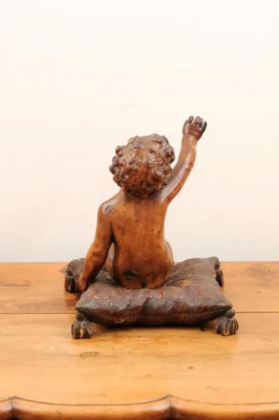 French 1780s Baroque Style Walnut Sculpture of a Putto Sitting on a Pillow