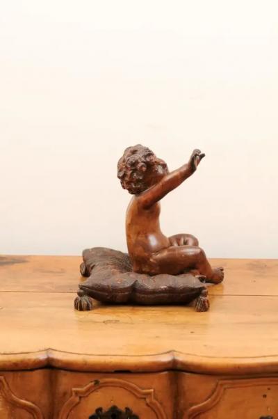 French 1780s Baroque Style Walnut Sculpture of a Putto Sitting on a Pillow