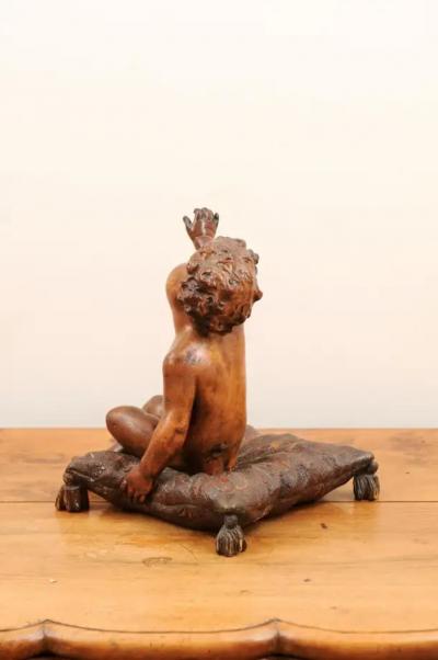 French 1780s Baroque Style Walnut Sculpture of a Putto Sitting on a Pillow