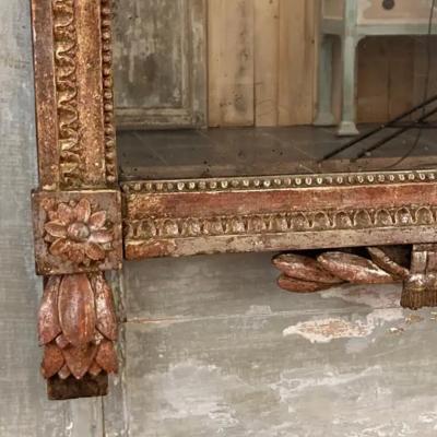 French 1790s Louis XVI Giltwood Wall Mirror with Carved Gardening Crest