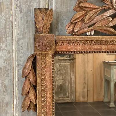 French 1790s Louis XVI Giltwood Wall Mirror with Carved Gardening Crest