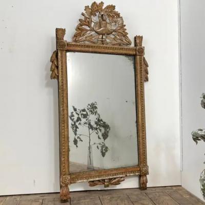 French 1790s Louis XVI Giltwood Wall Mirror with Carved Gardening Crest