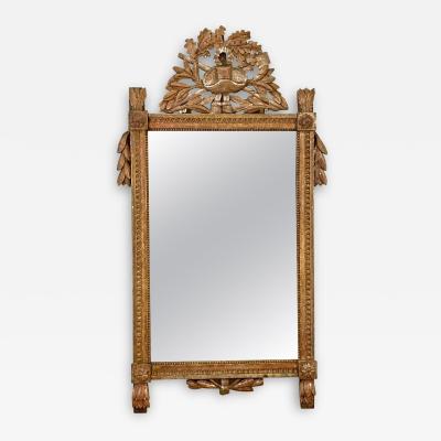 French 1790s Louis XVI Giltwood Wall Mirror with Carved Gardening Crest