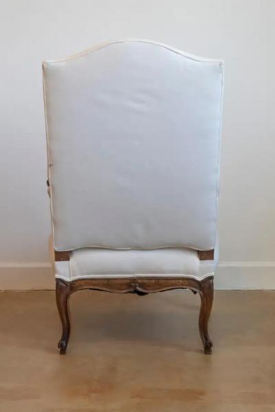 French 1840s Louis XV Style Walnut Fauteuil with Carved Accents and Upholstery