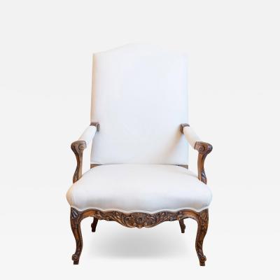 French 1840s Louis XV Style Walnut Fauteuil with Carved Accents and Upholstery