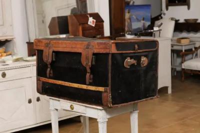 French 1890s Brown and Black Travel Trunk with Leather Straps and Aged Patina