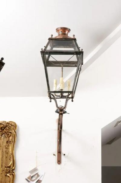French 1890s Iron and Copper Wall Lantern with Four Lights and Scrolling Bracket