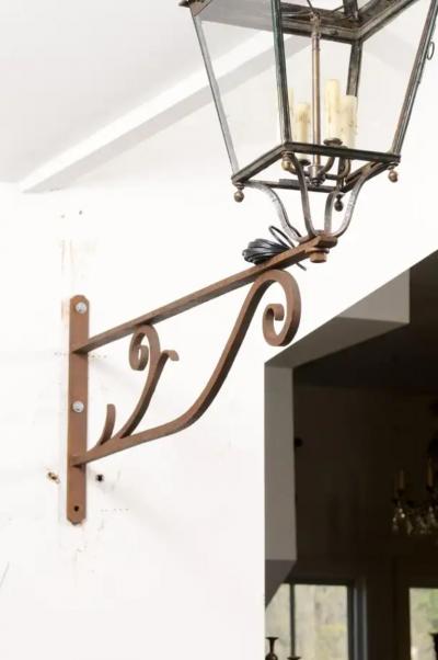 French 1890s Iron and Copper Wall Lantern with Four Lights and Scrolling Bracket