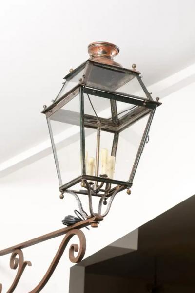French 1890s Iron and Copper Wall Lantern with Four Lights and Scrolling Bracket