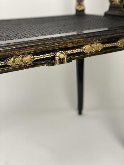 French 18th Century Carved Ebonized Window Bench with Gilded Accents France