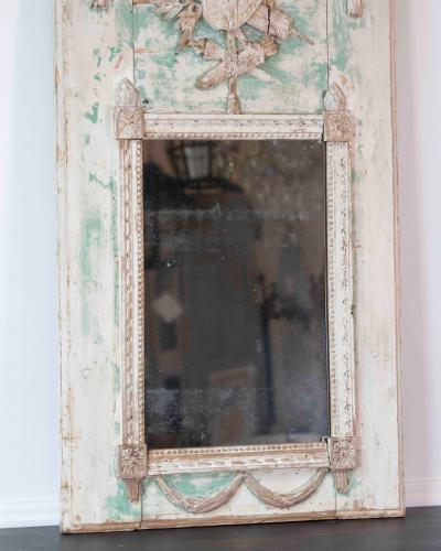 French 18th Century Louis XVI Carved Trumeau Mirror with Warrior Attributes
