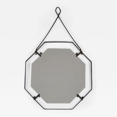 French 1960s octagonal mirror with wrought iron frame and hanging bar